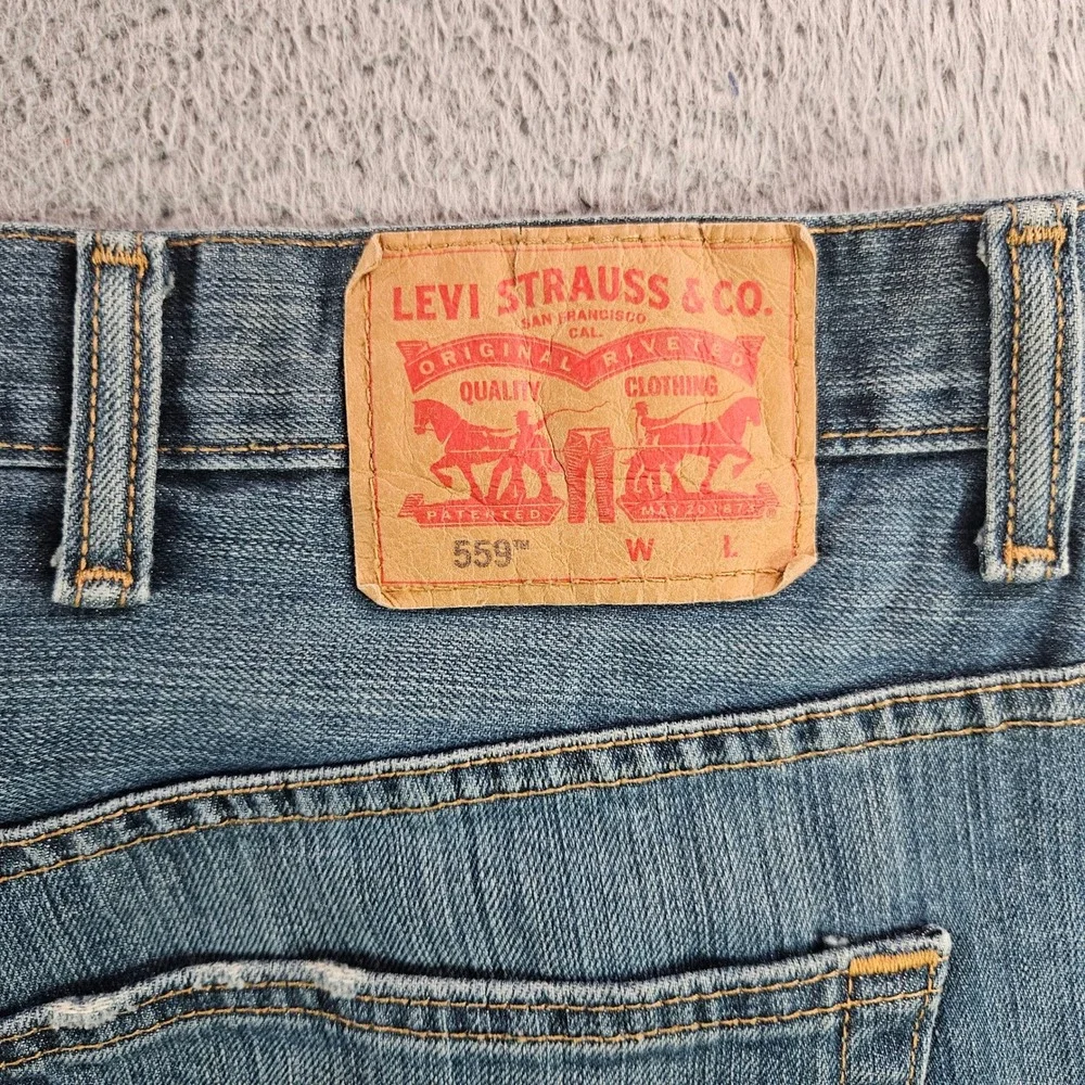 Levis 559 Relaxed Straight Jeans Mens 48x32 Medium Wash Blue Denim